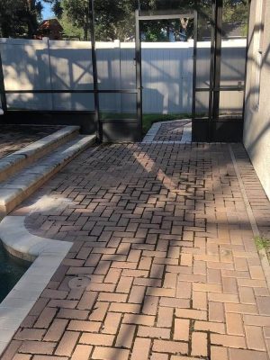 paver walkway next to pool